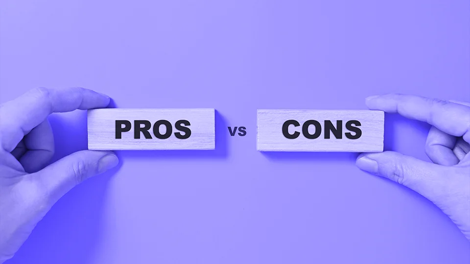 Hands holding ‘PROS’ and ‘CONS’ signs against a purple background.